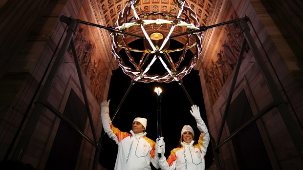 Пламенови горе у Милану и Кортини, отворене су 25. Олимпијске зимске игре