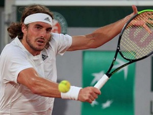 Циципас надиграо Изнера за осмину финала