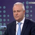 Око: Млађан Динкић